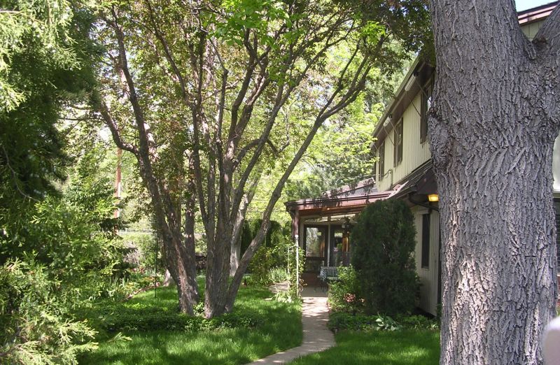 Side yard including heated sunroom